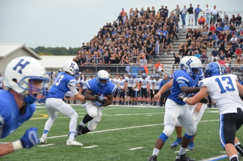 D.T. Williams, senior, receives the handoff.