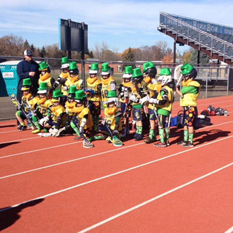 Rosemount players pose for a team photo. The team dressed up as leprechauns in honor of the their mascot.