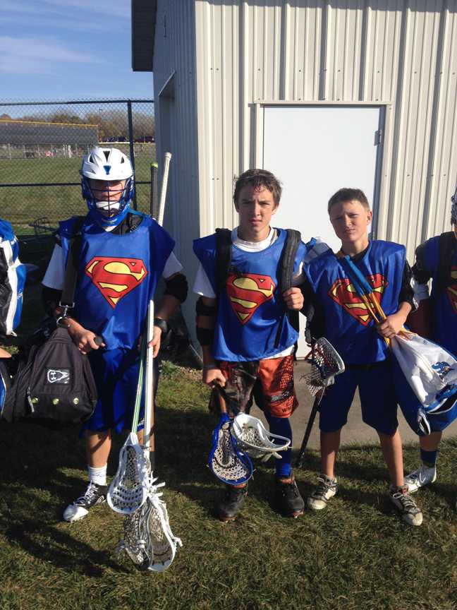 Youngsters pose in their team halloween costumes. Teams competed for the title of best halloween costume throughout the tournament. 
