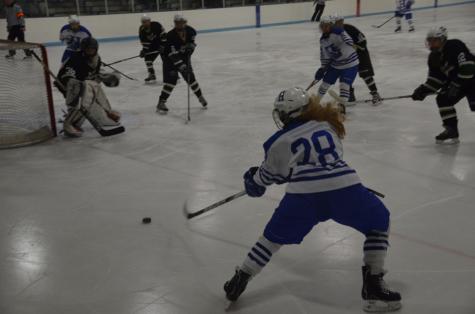 Gretchen Patterson, senior, controlling the puck in Thursday's win. 