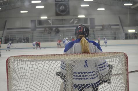 Molly Dionne, senior, waiting in the net.