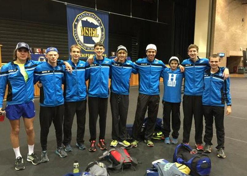 Photo of the boys varsity cross country team after their second place finish at the state meet. 