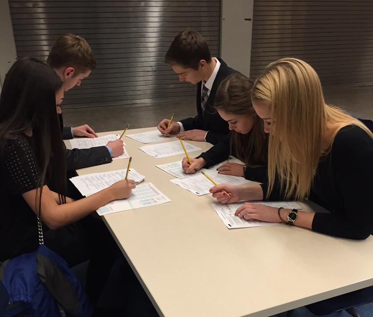 HHS students take a DECA practice test. 