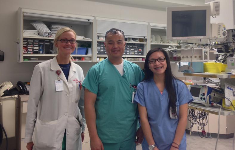 Lulu Johnson, senior, at Hennepin County Medical Center with her mentor, Dr. Jeffrey Ho. 