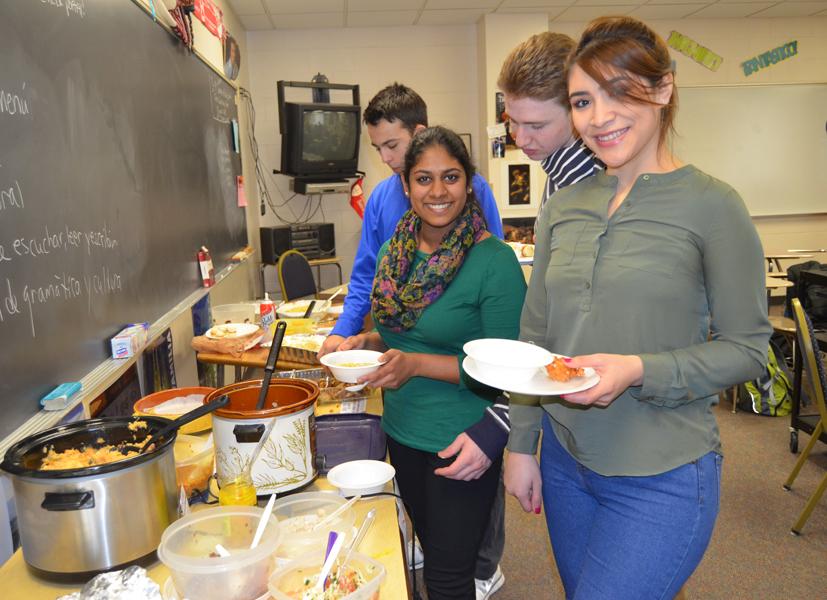 Students from Mrs. Sebenalers Spanish 6 class particiapte in La Extravaganza food project.