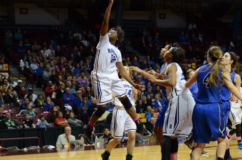 Nia Hollie, junior, goes for a layup in the state championship game.