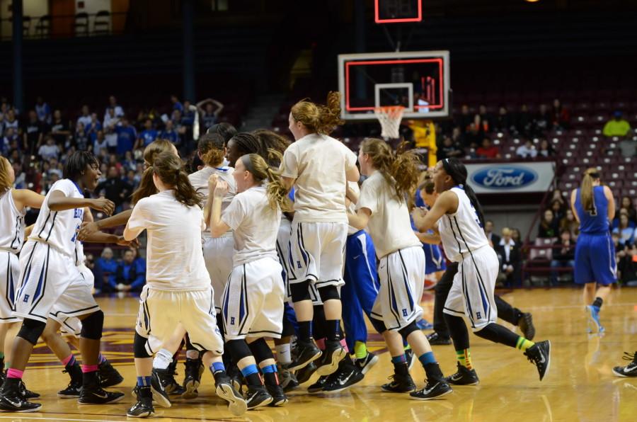 Girls basketball team reacts to their state championship win.
