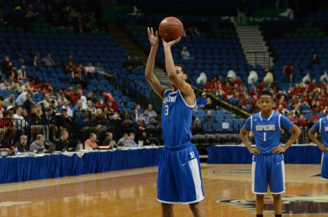 John Warren, senior, shoots a free throw.
