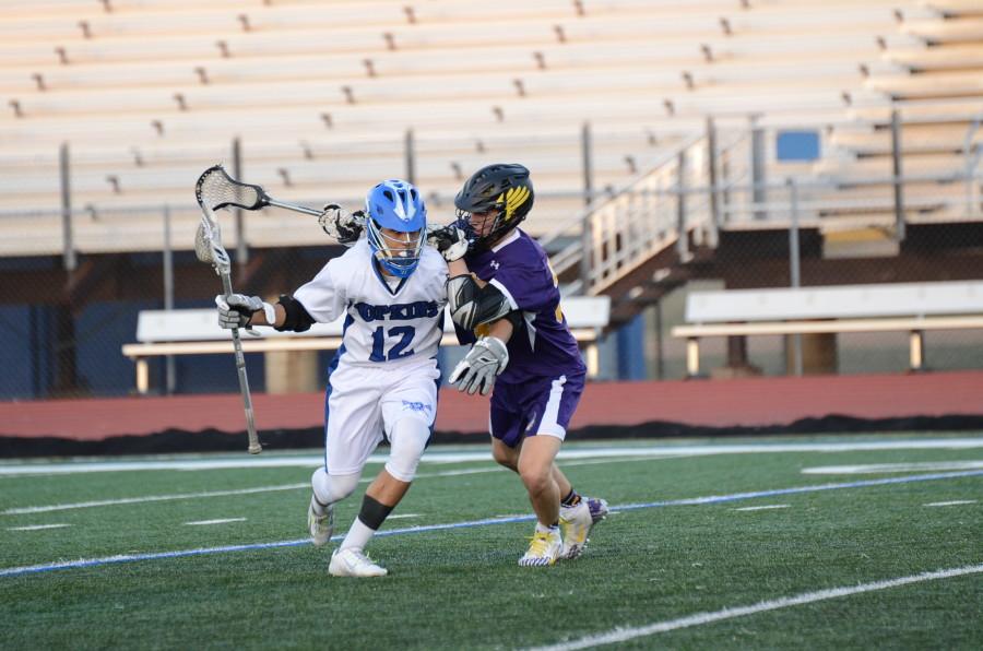 Scottie Zaccagnini, junior, protects the ball from his defender.
