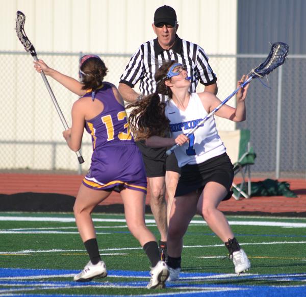 Sammi Galinson, sophomore, battling for the face-off during the Royals 8-9 loss to Chaska.