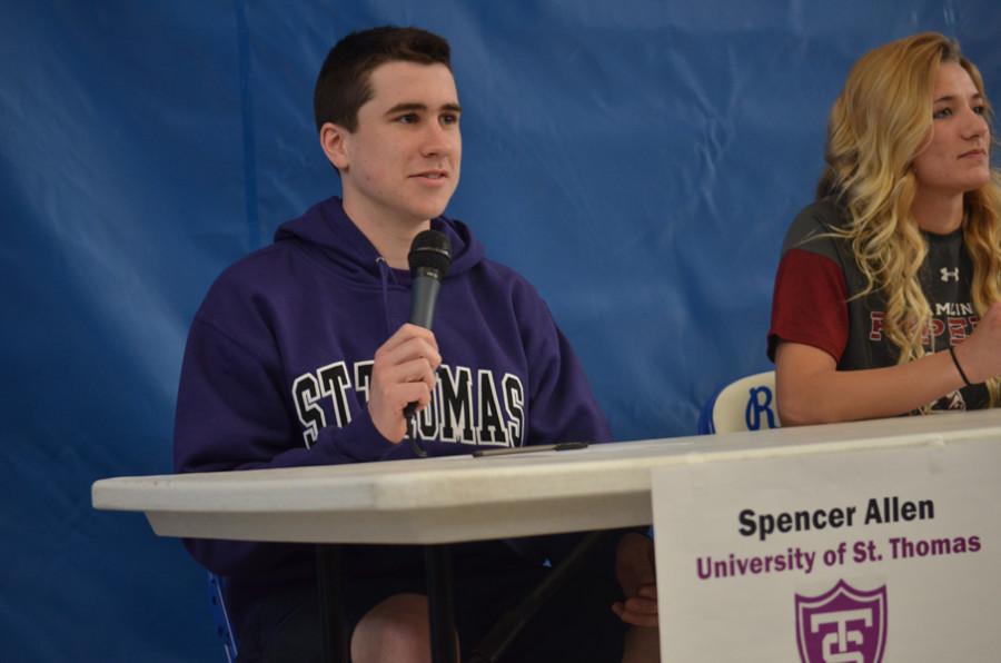 Spencer Allen, senior, signs with University of St. Thomas for swimming.