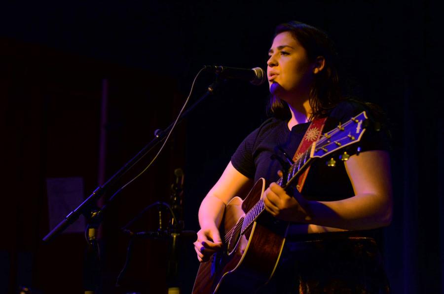 Allie Ries, junior, performs as an emerging songwriter at the Depot Coffee House.