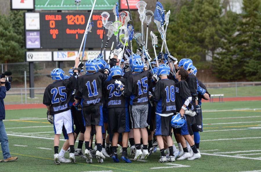 Boys lacrosse team gets ready to play against Eden Prairie. HHS lost 16-1.