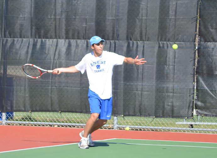 Daniel Grayson, senior, returning a strong serve in the Royals 2-5 loss to Armstrong.