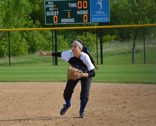 Jessica Crouser, senior, going after a ground ball in the Royals section win against St. Louis Park 16-0.