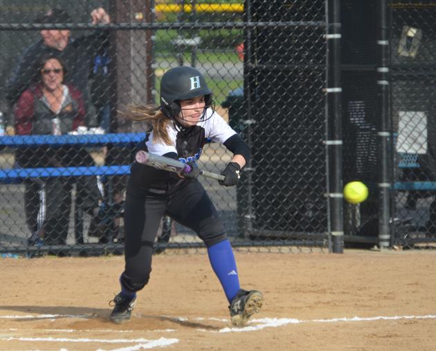Hannah+Kleist%2C+sophomore%2C+bunts+the+ball+to+get+on+base+in+the+Royals+section+win+against+St.+Louis+Park+16-0.