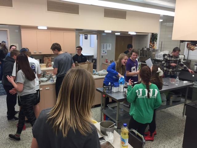Groups baking different treats that will be sold for the mission trip