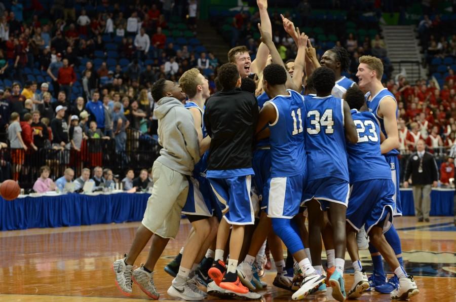 The HHS boys basketball team wins the state championship.