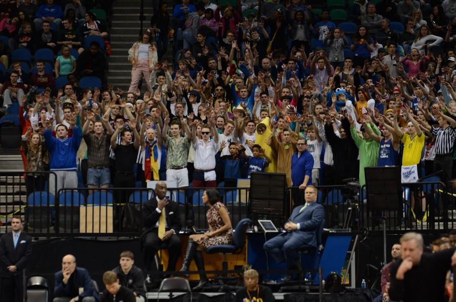The HHS student section supports the boys basketball team in the semifinal state game against the Apple Valley Eagles.