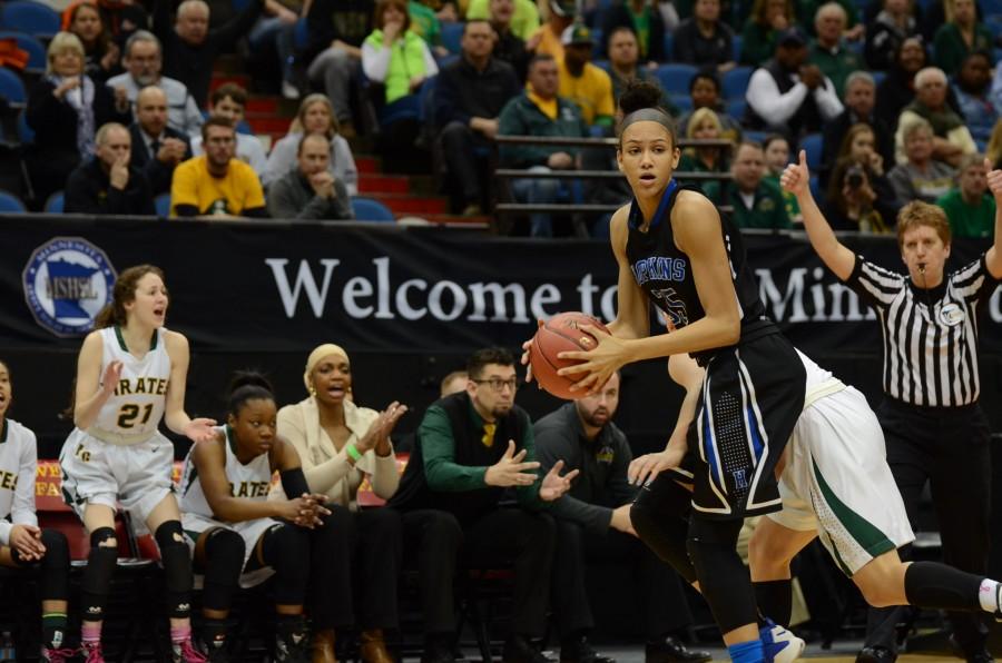 Angie Hammond, sophomore, looks for a pass in the offensive end during the quarterfinal state game.