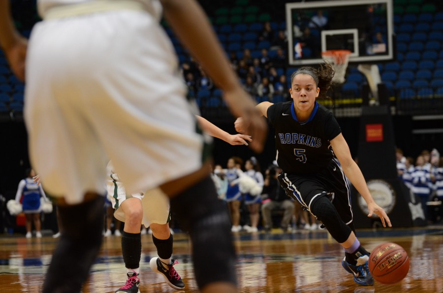 Dee Dee Winston, junior, dribbles the ball down the court in the quarterfinal state game.