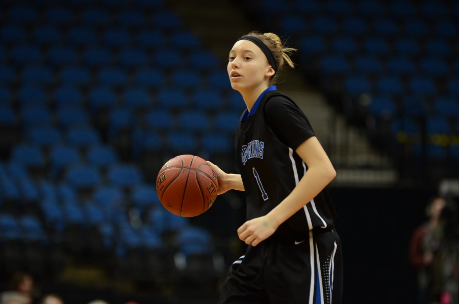 Paige Bueckers, eighth grade, dribbles the ball down the court in the quarterfinal state game.