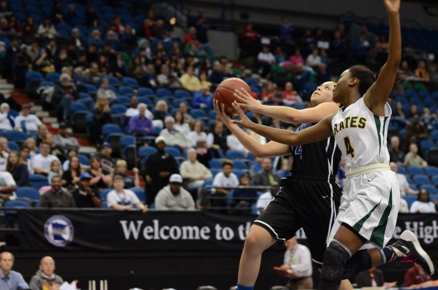 Ashley Bates, senior, goes in for a layup in the quarterfinal state game.