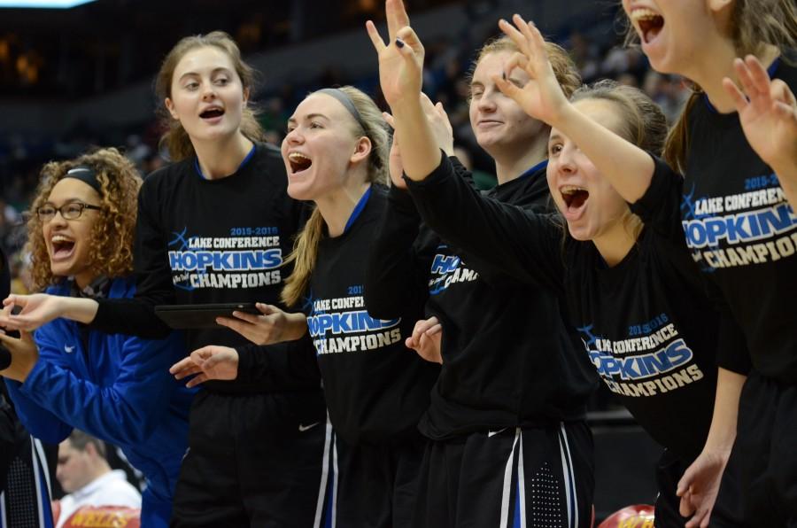 The HHS girls basketball team celebrates after a free throw in the quarterfinal state game.