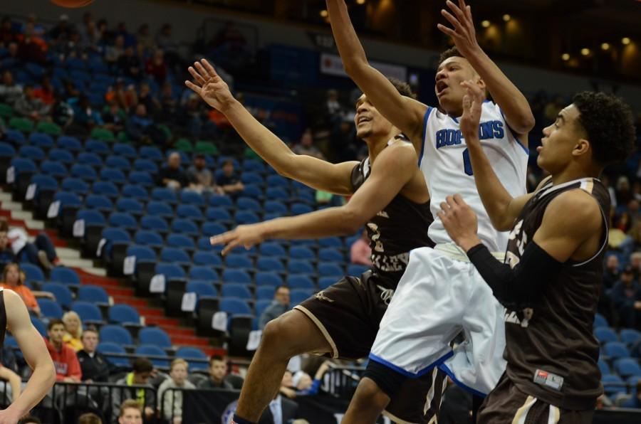 Ishmael El Amin, junior, goes in for a shot during the semifinal state game against the Apple Valley Eagles.