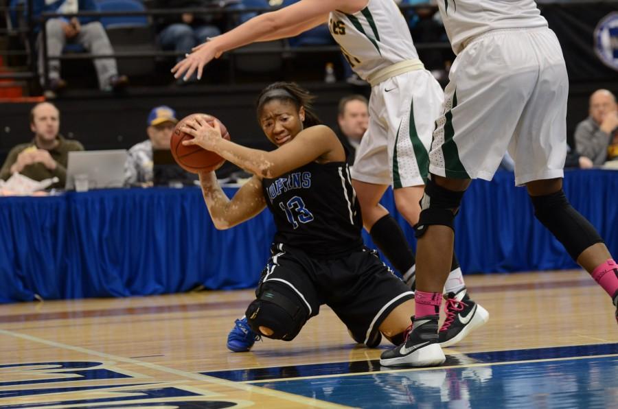 KAezha Wubben, senior, defends the ball in the offensive end during the quarterfinal state game.