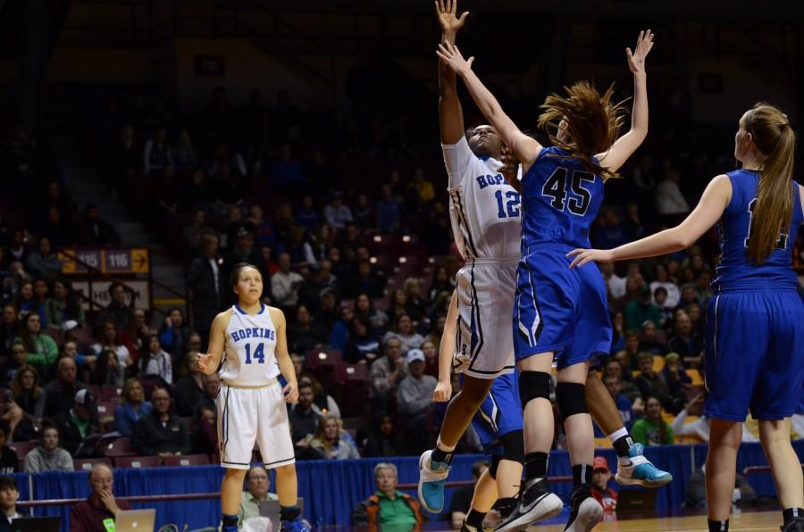 Nia Hollie, senior, goes in for a layup in the semifinal state game.