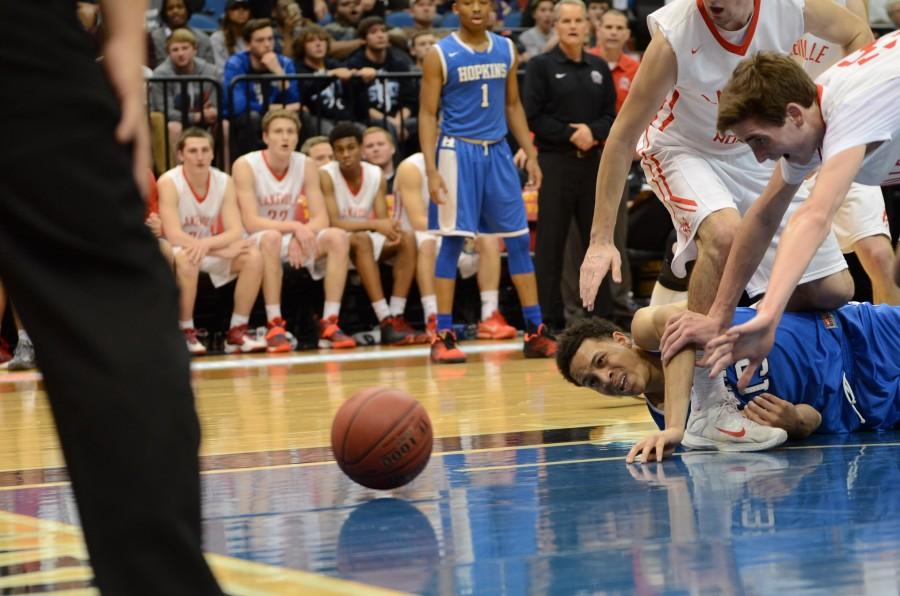 Amir Coffey, senior, falls in the offensive zone in the AAAA state final game.