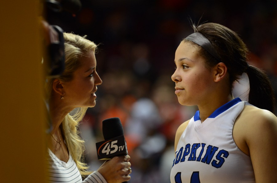 Ashley Bates, senior, gets interviewed by 45 T.V. after the Royals beat Eastview in the semifinal state game.
