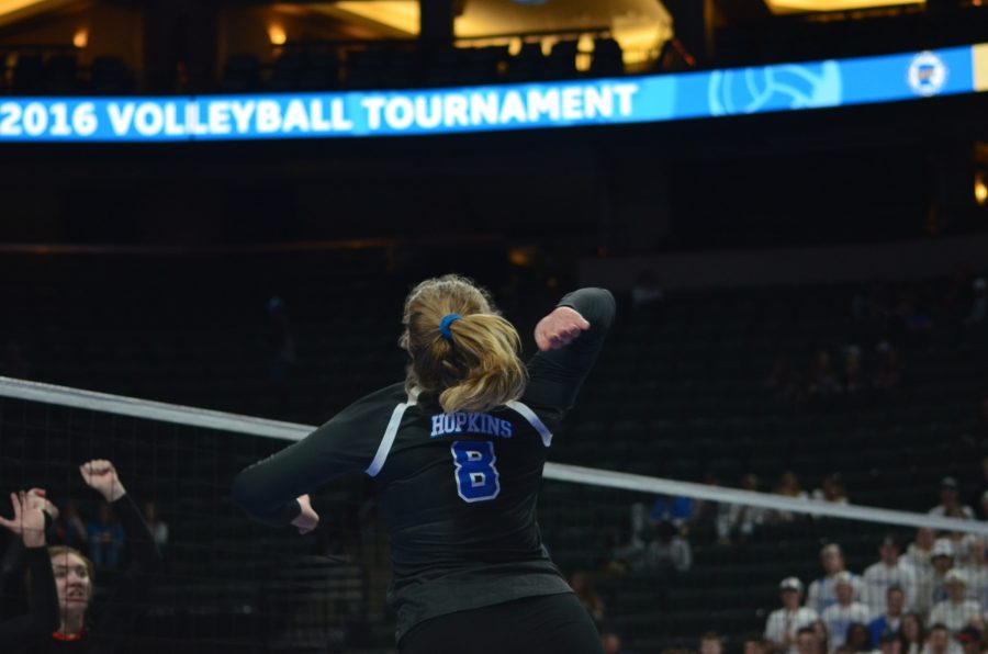 Greta Werner, senior, prepares to smack the ball during the state volleyball game.