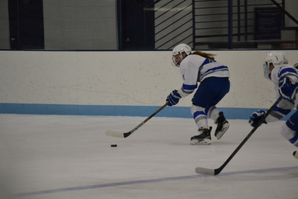 Annika+Patterson%2C+junior%2C+takes+the+puck+into+the+offensive+zone+in+a+3-1+win+over+Holy+Family.