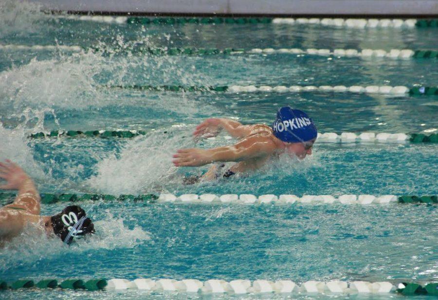 Molly Meland, sophomore, competes at the Art Downey Aquatic Center.