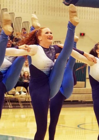Taylor Rosenzweig, senior, performs at one of the Royelles' competitions,