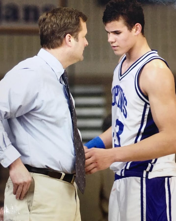 A young Kris Humpries talks to Coach Ken Novak.