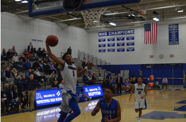 Ish-El Amin goes up for dunk on a fast break. The Royals won 71-65 against the Skippers. 