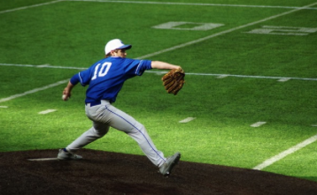 Luke Polyak, sophomore, pitches in a Wayzata game located at the US Bank Stadium. The Royals lost 4-0.