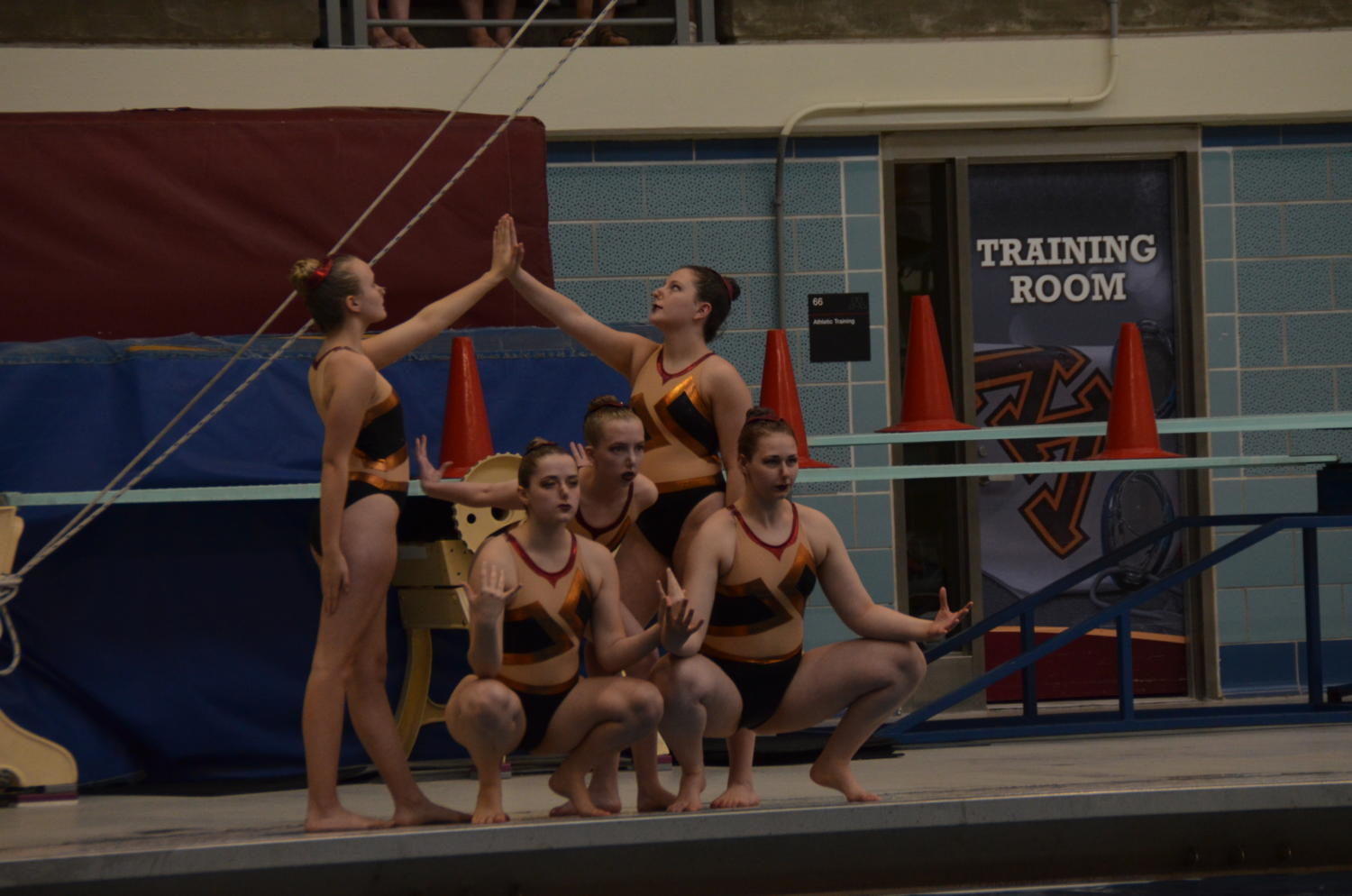The Long division team of Elizabeth Coleman, Ellen Mattson, and Lily Provenzano, sophomores,  Lily Smith, junior, and Katie Gunderson, senior, performs their routine Battle Cry at the 2017 Minnesota Synchronized Swimming State Invitational on May 26.