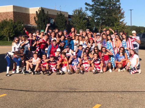 Photo of Team Tailgate repping USA theme at second game of the season against the Waconia Wildcats. 