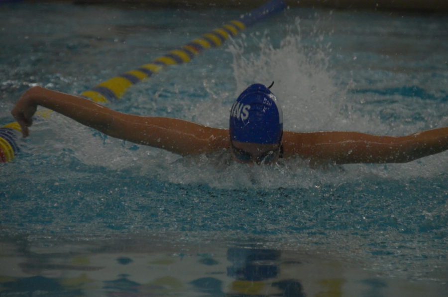 Ellie Miranda, senior, swims the butterfly during her 200 yard individual medley (IM). Miranda qualified for the section finals meet in the fifteenth-place seed, swimming a time of 2:24.64.