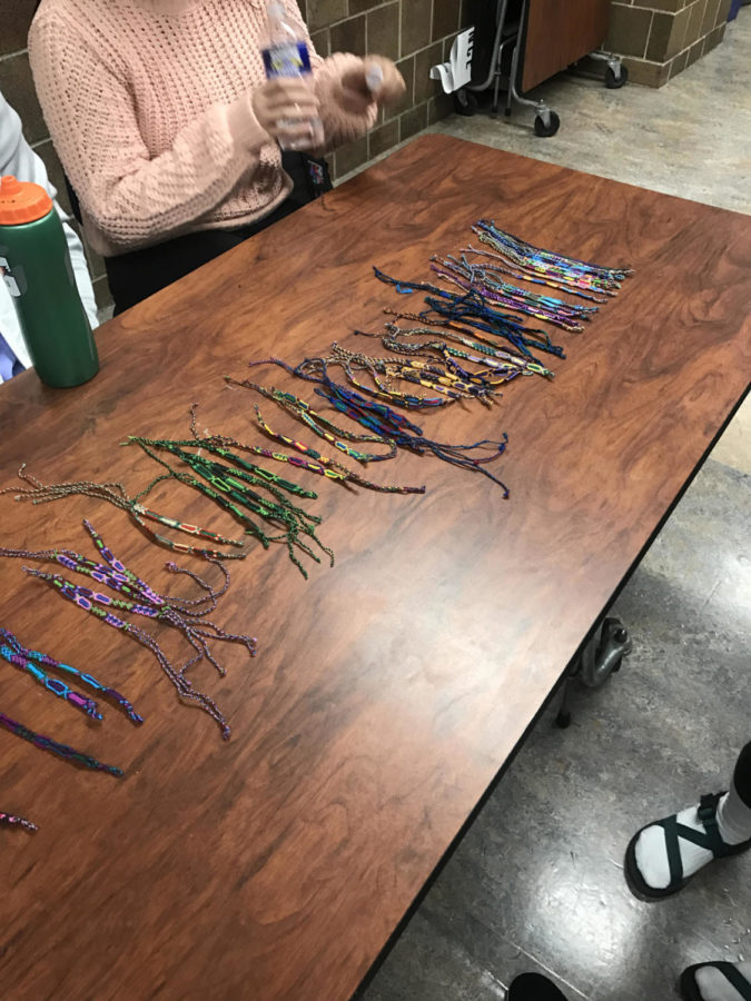 Photo taken at lunch of colorful bracelets made by Student Wellness Committee.  