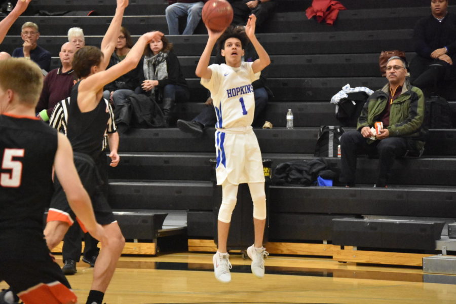 Blaise Beauchamp, sophomore, shoots three from corner. The Royals beat the Orioles 98-70.