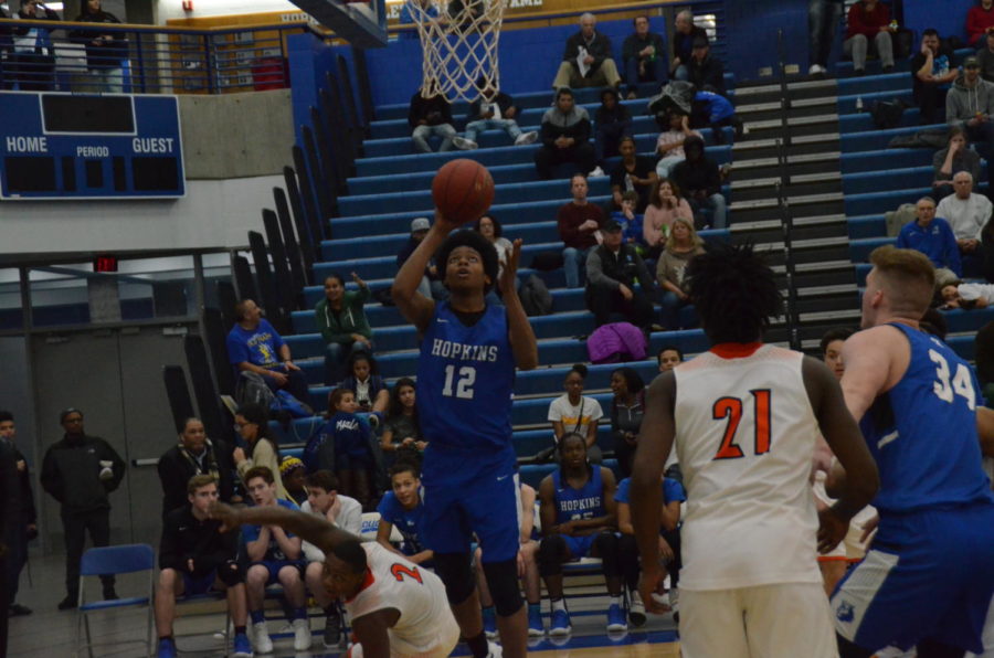 Kerwin Walton, junior, goes up for a shot in a game last season. Walton is set to start at point guard this season for the Royals.