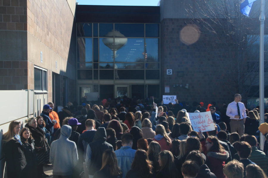 Students file back into HHS in silence after 17 minutes of protest, rallies, and unity during the walkout.