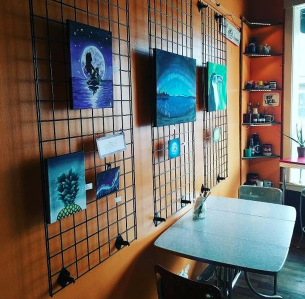 Junior provides art at local coffee shop in Downtown Hopkins