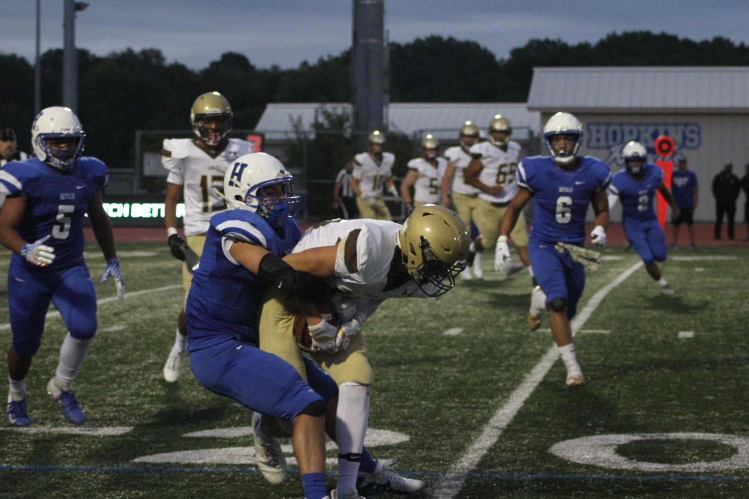 Will Stein, senior, takes down an opposing Apple Valley Eagle in the season opener. The Royals travel to Waconia to look for their second win of the season.