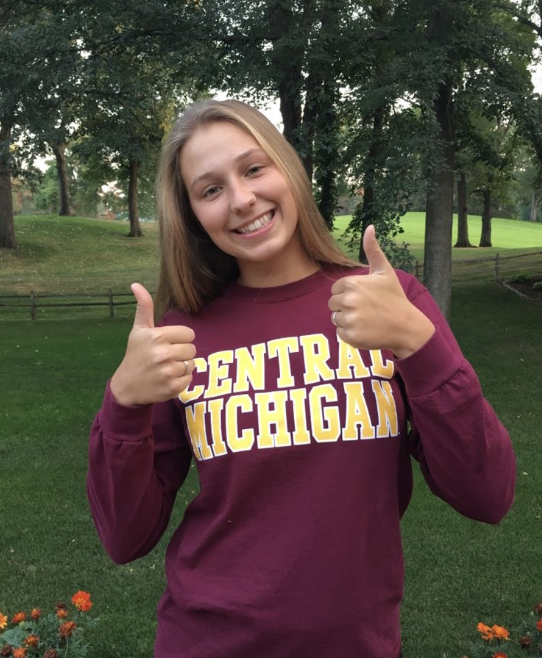 Anna+Erickson%2C+senior%2C+posing+after+her+recent+commitment.+Erickson+commited+to+Central+Michigan.